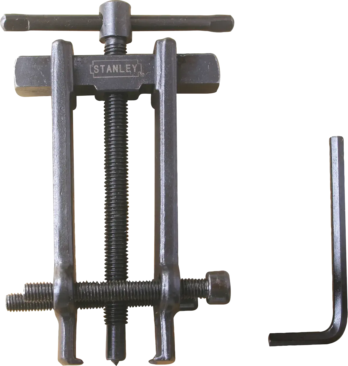 Stanley 94-829 juego de extractor de engranajes con llave hexagonal, herramienta metálica sobre fondo blanco, ángulo frontal.